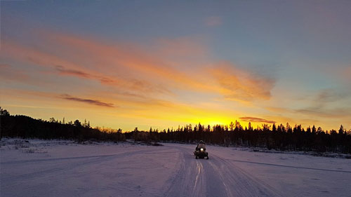 Enjoy miles of groomed snowmobile trails right out your door